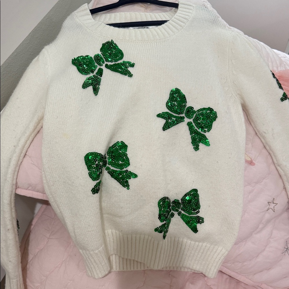 Girl’s White Sweater with Green Bow Accents